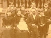 clipping from extended family portrait showing only the Fiegenbaum-Kriege family