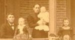 clipping from extended family portrait showing only the Jacoby-Fiegenbaum family