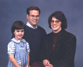 studio photograph of Katie, Eric and Linda