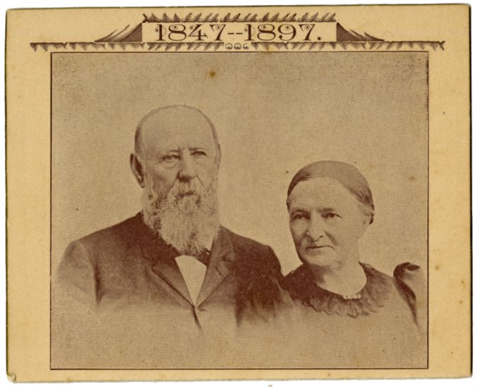 photographic portrait of Rev. Heinrich H. and Clara C. (Kastenbudt) Fiegenbaum on a card commemerating their fiftieth wedding anniversary