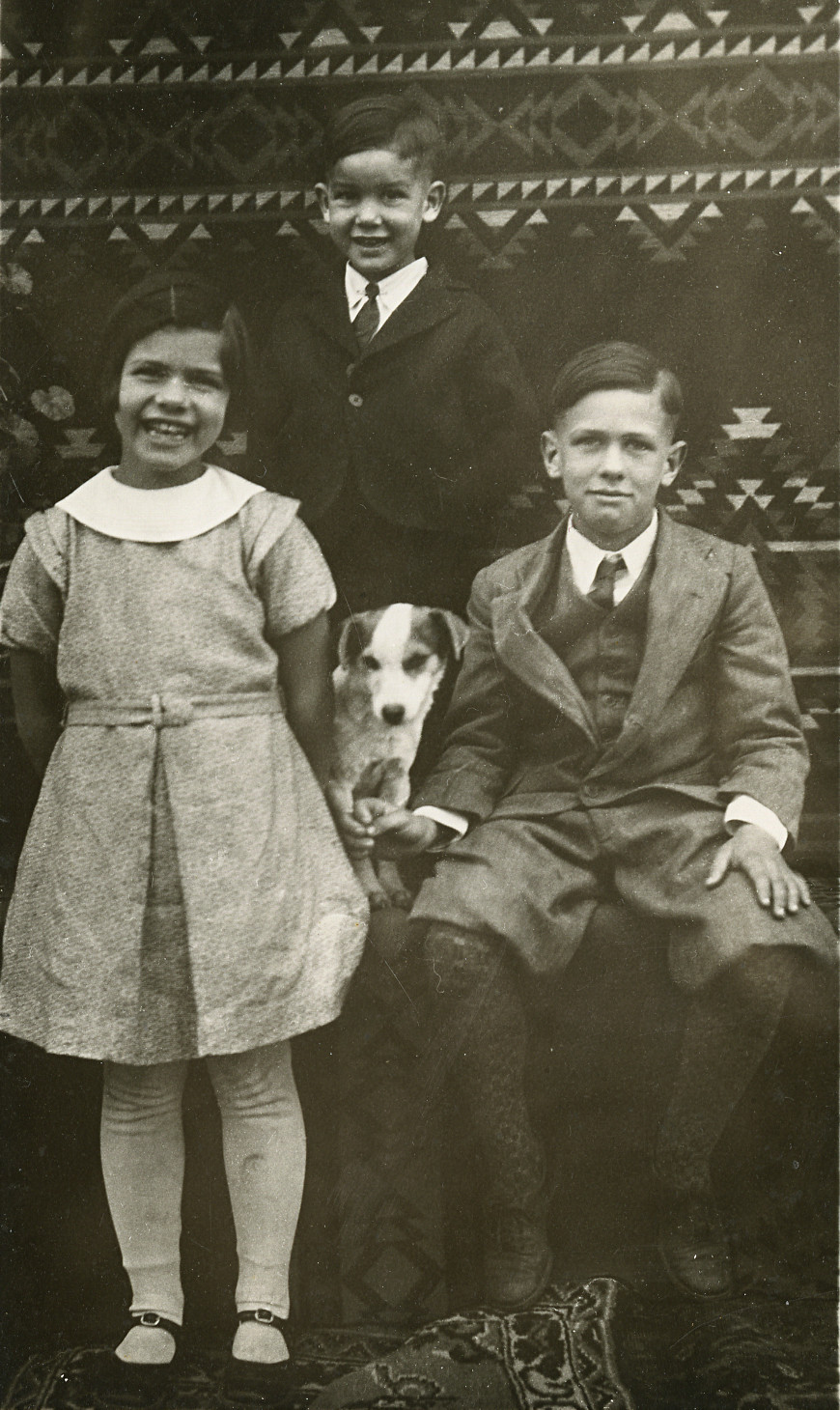 portrait of Dorothy Lorraine Fiegenbaum, Henry Martin Fiegenbaum, J. W. Fiegenbaum, and the family dog