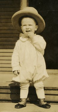 photo of a young J. W. Fiegenbaum wearing his father's hat at Miami, Oklahoma, about 1926