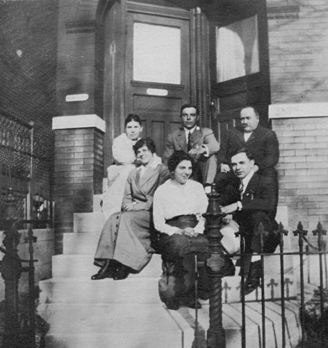photo of the George L. and Charlotte E. (Etling) Gerber family seated on the front steps of their home in St. Louis