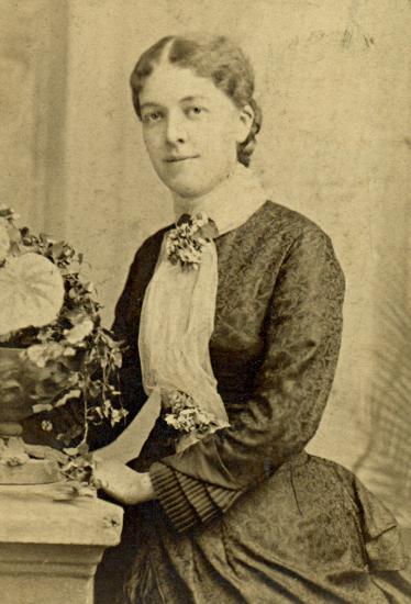 photographic studio portrait of Julia B. Gillespie as a young woman