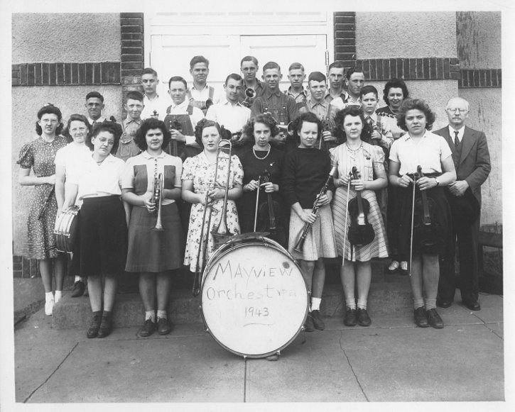 photograph taken outside the school building of the members of the Mayview High School Orchestra in 1943