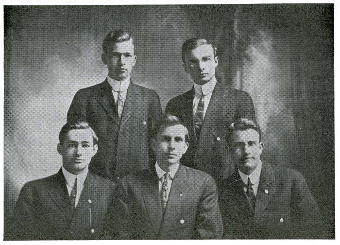 photograph from the college yearbook of the five male members of the First Gospel Team